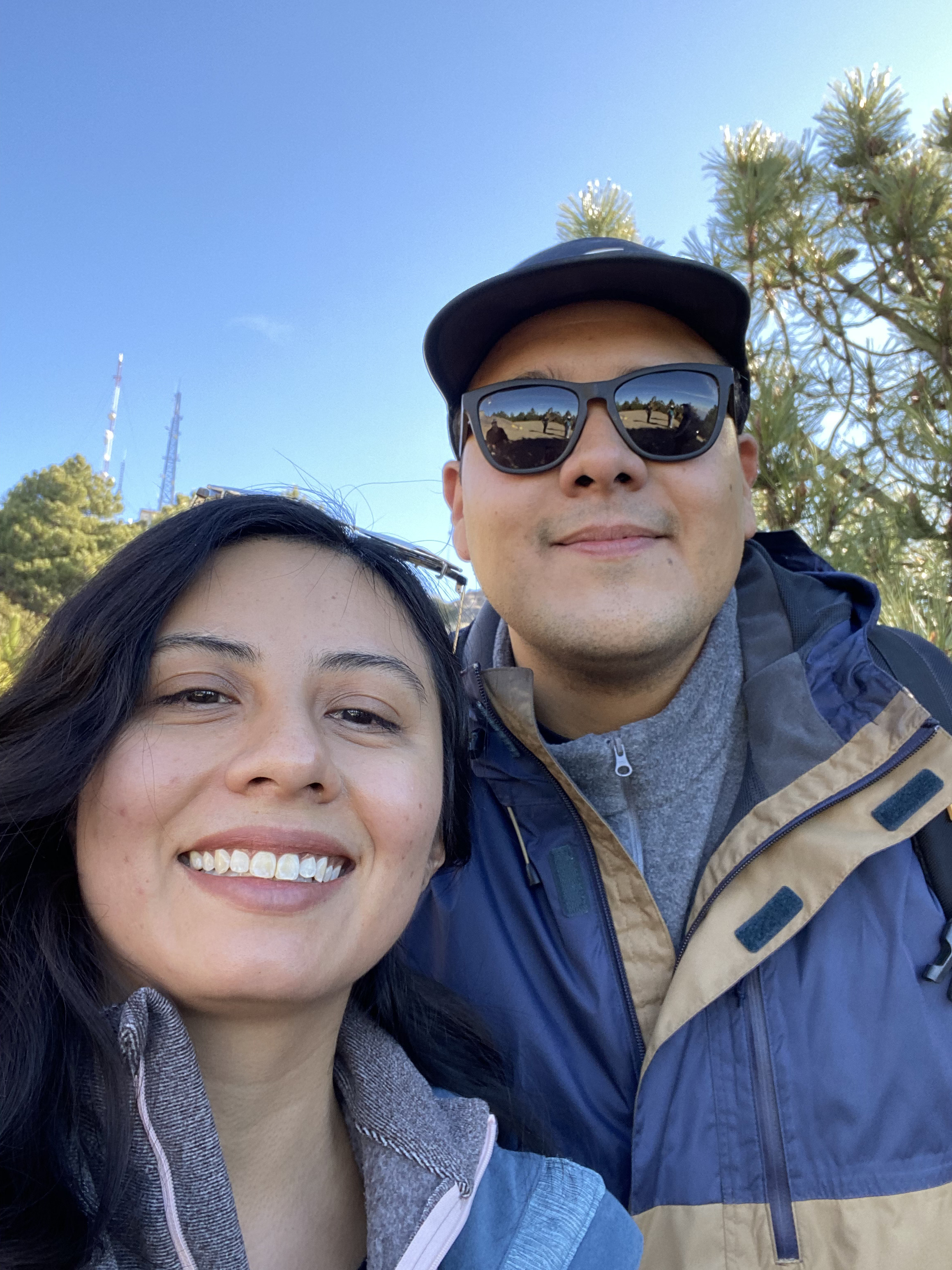 a couple of mexican people hiking